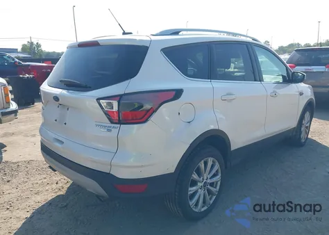 2017 Ford Escape Titanium z USA, uszkodzony, nr VIN 1FMCU9J94HUC20180